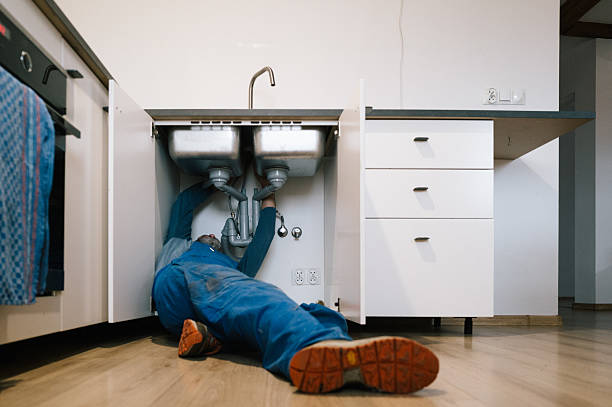 Professional Drain Cleaning technician working in Steilacoom, WA